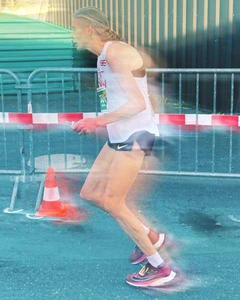 Runner in motion during race.