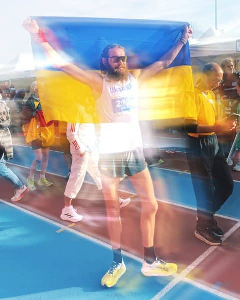 Runner celebrating with Indian flag