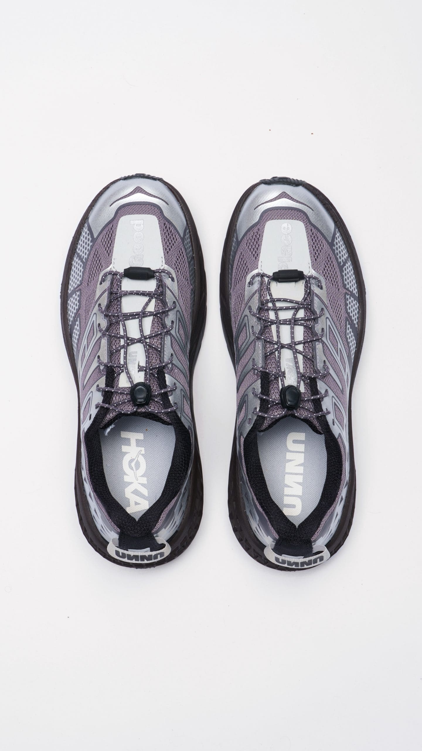 Purple and gray athletic shoes