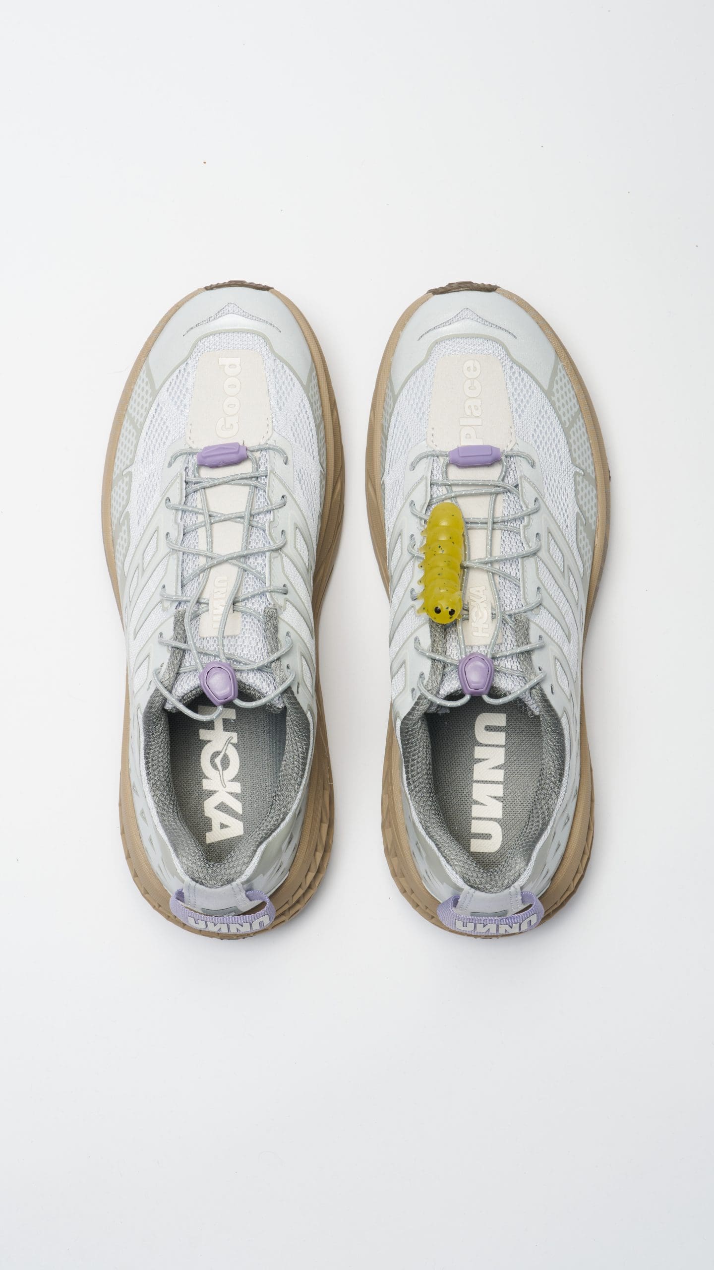 Gray running shoes with unique design