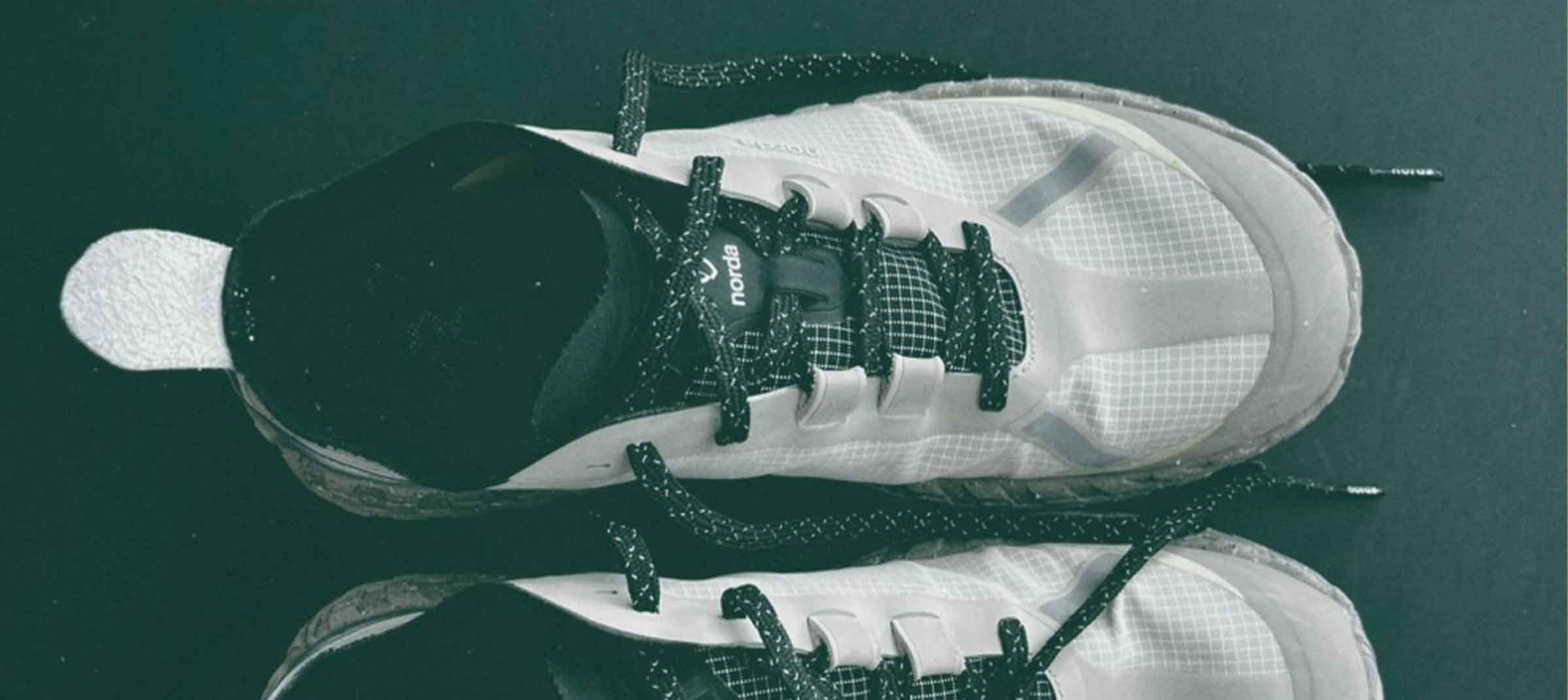 Norda 001a Review: A Remarkable Trail Running Shoe White athletic shoes with black laces - Norda 001a