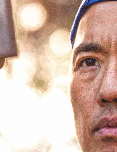 Man focused on filming outdoors. Billy Yang