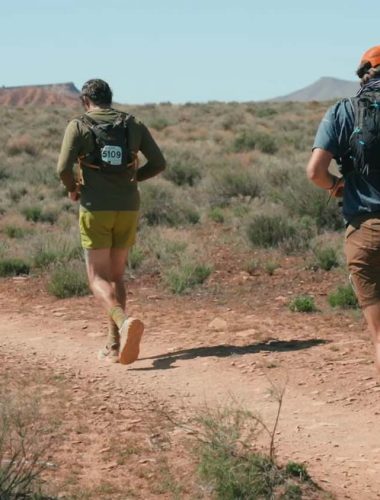 Runners on a desert trail. Luxury Running Brands.