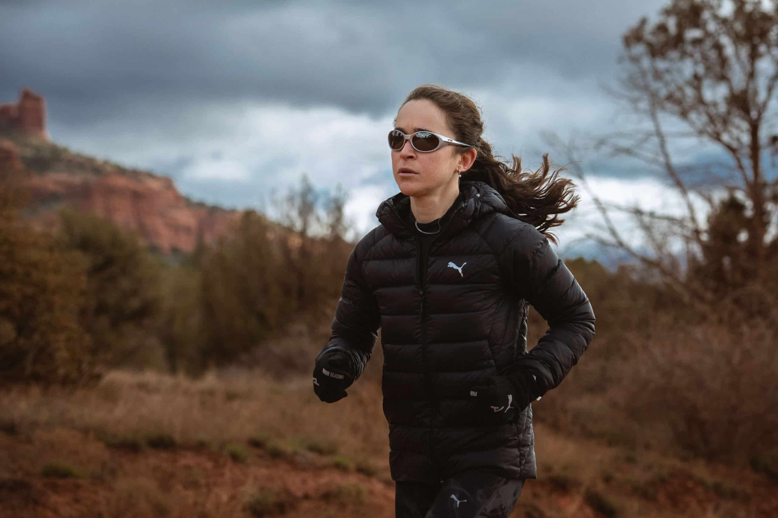 Runner crossing a cattle guard.